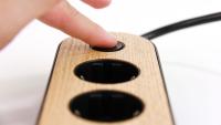 mynolla-power-strip-black-oak-button.jpg