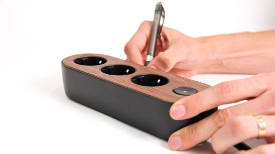 mynolla-power-strip-black-walnut-hands.jpg